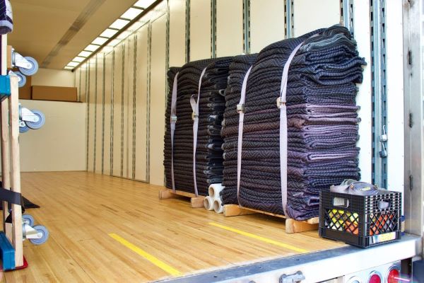 Stack of moving blankets in the back of a tractor trailer Stack of moving blankets in the back of a tractor trailer